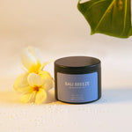 Load image into Gallery viewer, light musk and amber tin candle
